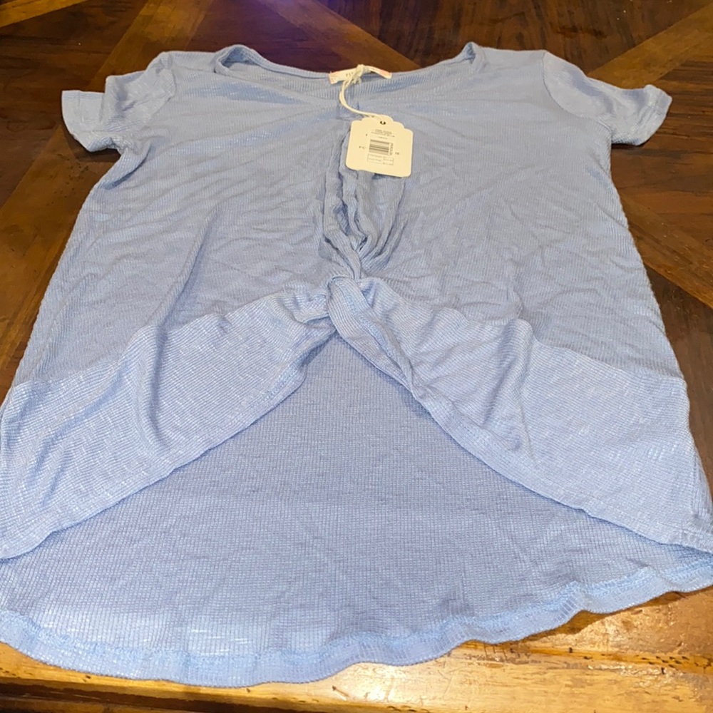 Blue top with shortened height in front
